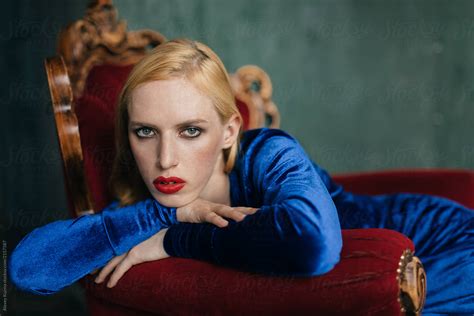 Young Transgender Woman In Blue Velvet Dress By Stocksy Contributor Alexey Kuzma Stocksy