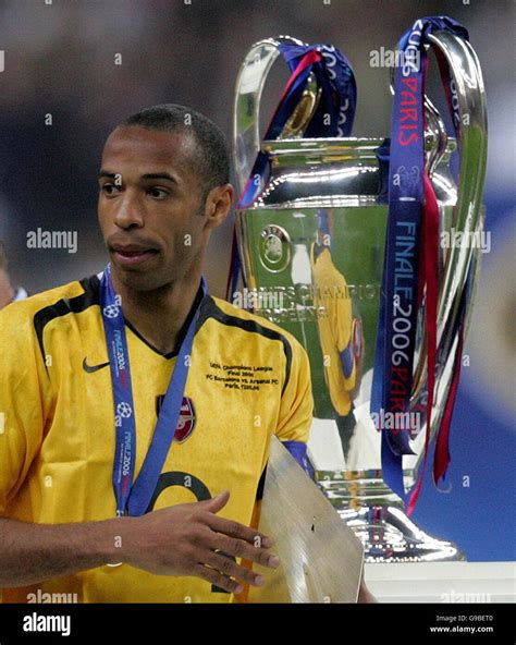 Arsenals Thierry Henry Walks Past The Trophy After The Uefa Champions