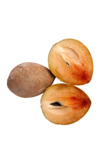 Sapodilla Plum With Cut Isolated On White Stock Photo Download Image