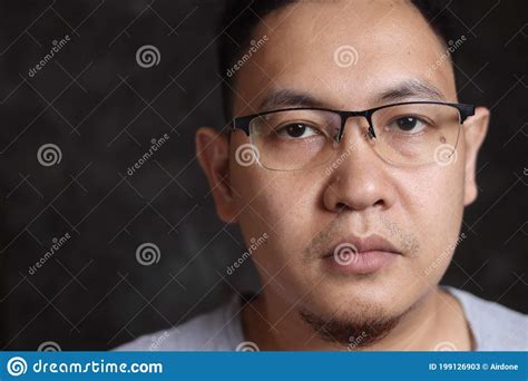Close Up Head Shot Portrait Of Asian Man Wearing Glasses Looking At Camera Stock Image Image