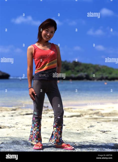 Beautiful Japanese Girl Stands On Hoshizuna Beach Iriomote Island