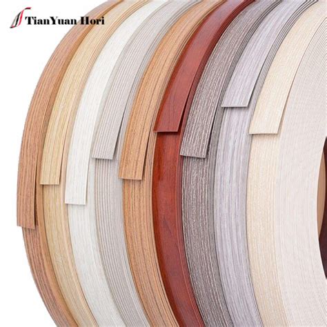 Plastic veneer is widely used for countertops because of its inherent durability and easy cleanup. laminated wood grain plastic desk edging decorative door ...