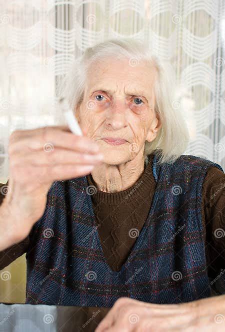 Grandma Smoking A Cigarette At Home Stock Photo Image Of Lady Addict