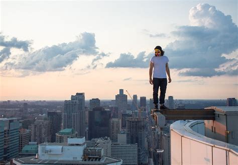 Rooftopping Dizzying Photographs Of People Almost Falling Off
