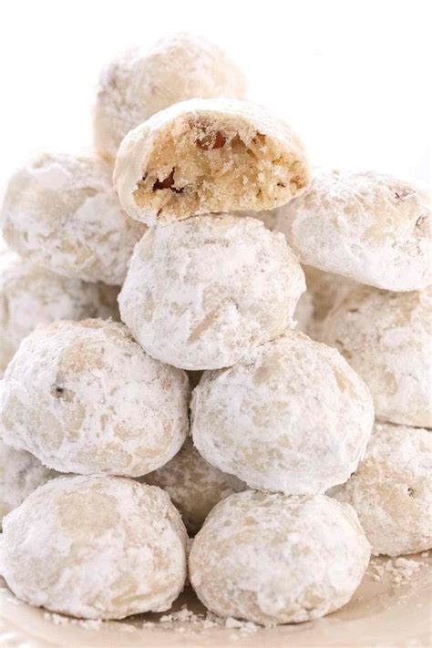 Buttery Shortbread Cookies Filled With Pecans And Rolled In Powdered