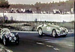 1949 Le Mans 24 hours race winner's car overtaking #43 MG TC Special ...