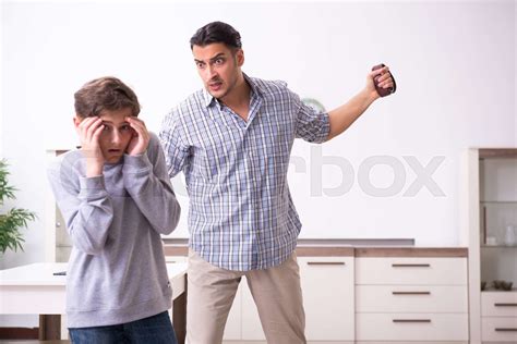 Father Beating And Punishing His Sone Stock Image Colourbox
