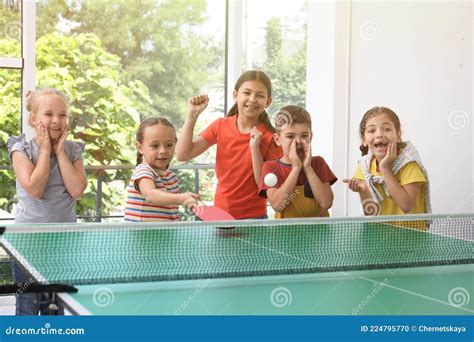 Cute Happy Children Playing Ping Pong Indoors Stock Photo Image Of