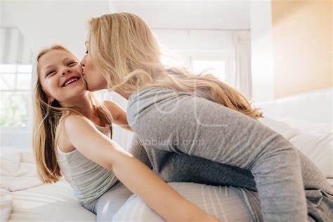Loving Mother And Daughter On Bed Jacob Lund Photography Store