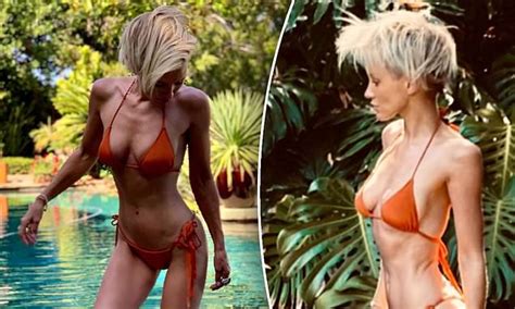 Nicky Whelan Shows Off Her Beach Body In An Orange And Blue Bikini My