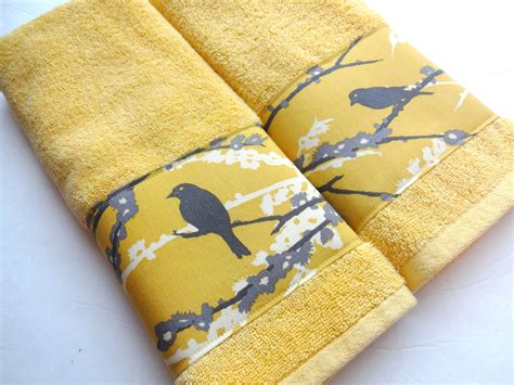The first step to getting the best results is to fold the towels. Bath Towel yellow and grey yellow birds yellow towels grey