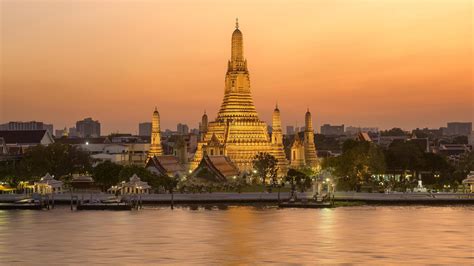 Beautiful View Of Wat Arun Temple At Sunset In Bangkok Thailand