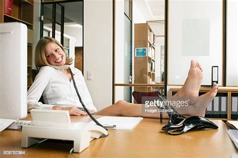Bare Feet On Desk Photos And Premium High Res Pictures Getty Images