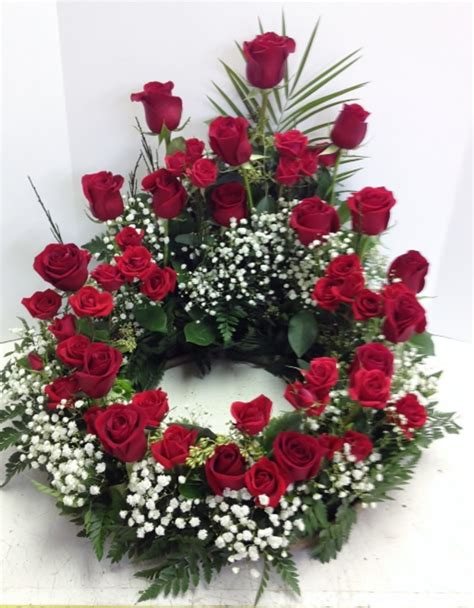 Beautiful sympathy casket sprays flowers, bouquets, or wreaths arranged and delivered by our wellington florists. Roses Surround the Urn | $150 and above, Funeral: For the ...