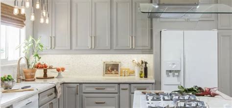 I love this oblong inset handle; 32 Kitchen Cabinet Hardware Ideas | Sebring Design Build