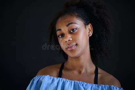 Beautiful Teenage Afro American Girl Looking At Camera And Smiling