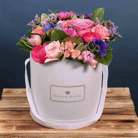 We offer expedited same day delivery on our flowers, plants, and gifts as long as you order by 2 p.m. mother day hatbox | Send flowers online, Flowers online ...