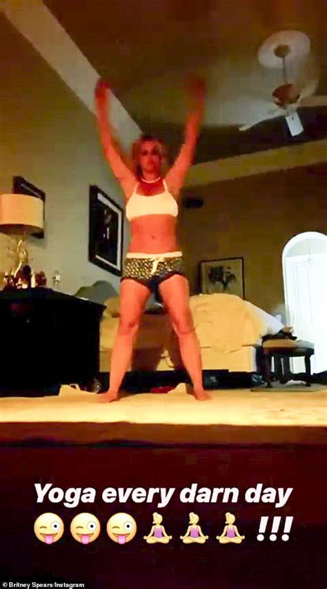 Britney Spears Shows Off Her Toned Abs In A Sports Bra And Shorts While Doing Yoga At Home