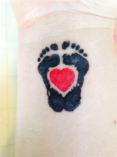 Tattoo Of Tiny Baby Feet Tribal Tattoos X