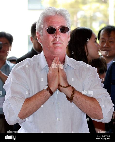 Us Actor Richard Gere Puts His Hands Together During His Visit To The