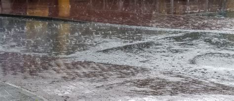 Wet Ashpalt Road Texture Heavy Rain Drops Falling On City Street During Downpour Stock Photo
