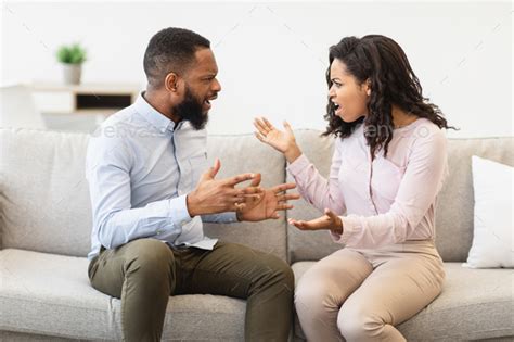 Young Married Black Couple Having Fight Shouting At Each Other Stock