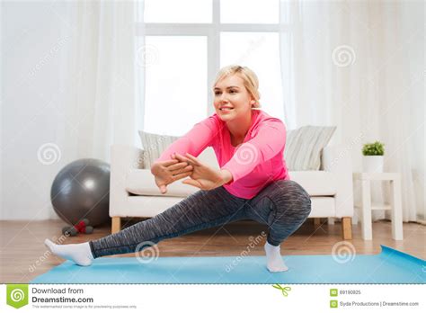 Happy Woman Stretching Leg On Mat At Home Stock Image Image Of Posture Lunge 69190825
