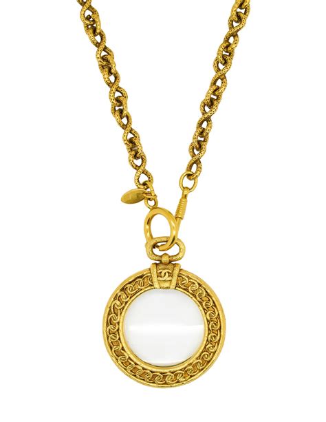 Maybe you would like to learn more about one of these? Chanel Vintage Gold Magnifying Glass Loupe Necklace - from ...