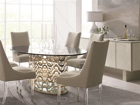 Gold dining room set is designed to host your most elegant tables. Caracole Classic Whisper of Gold 76''W x 48''D Oval Dining Table | CACCLA416203