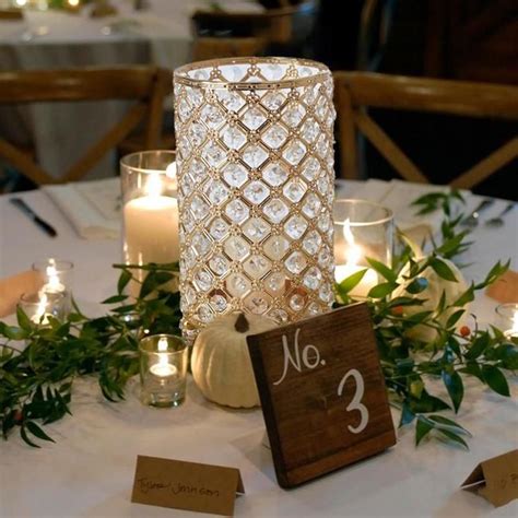 We offer several pillar holders to accompany your candles. Set of 2 - 9" Tall Metallic Gold Crystal Beaded Pillar ...