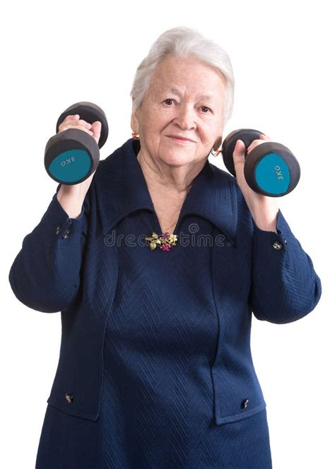Happy Old Woman Making Fitness Training With Dumbbells Stock Photo