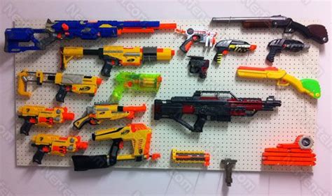 Nerf gun storage airsoft storage pistola nerf nerf party slat wall toy rooms kid spaces new room kids bedroom. Pin on Dartanyon