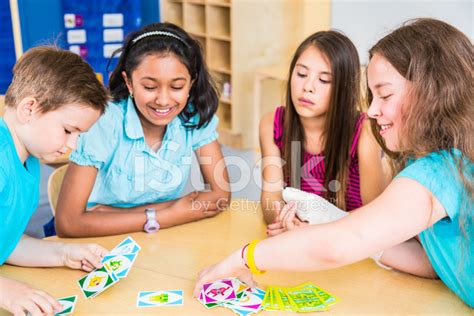 School Children Playing Card Game Stock Photo Royalty Free Freeimages