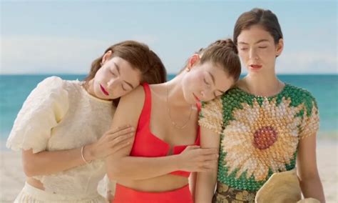 lorde and her past selves visit the beach in ‘secrets from a girl video
