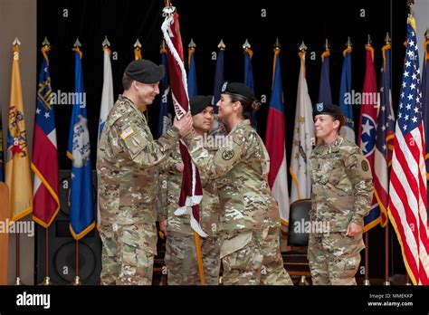 Csm Janell Ray Hands The Battalion Flag To Col Kevin Bass During The
