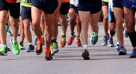 Runners To Race To The Finish Line Of The Marathon Stock Photo Image