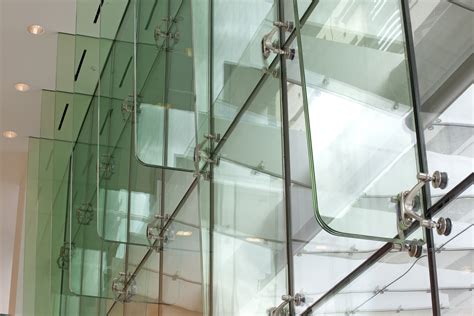 first and main structural glass wall systems vestibule enclosure elevator architectural glass
