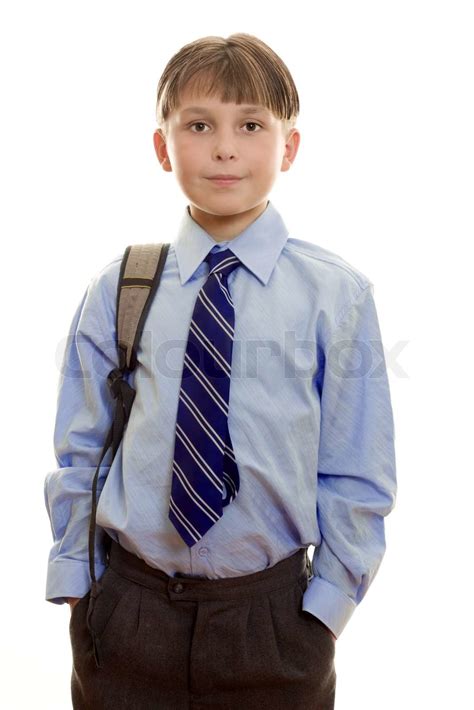 Standing School Boy Wearing A Uniform With Hands In Pockets And