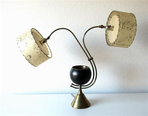 Each lamp measures 33 tall and 26 wide. Atomic Age Adjustable Mid-Century Modern Majestic Lamp 1950s For Sale at 1stdibs