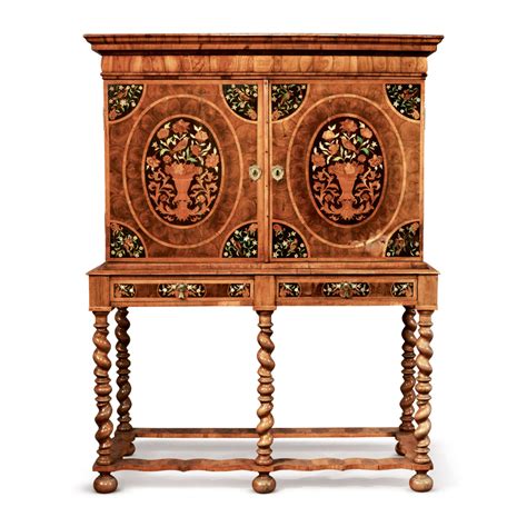 A William And Mary Oyster Veneered Walnut And Floral Marquetry Cabinet