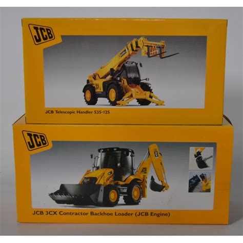 Two Boxed Joal 125 Scale Diecast Jcb Models To Include A 3cx Backhoe