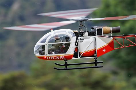 Red And White Helicopter Flying · Free Stock Photo