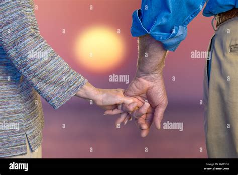 Couple Holding Hands Up Close Hi Res Stock Photography And Images Alamy