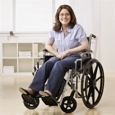 Photo Of A Smiling Woman Sitting In A Wheelchair Stellar Transportation