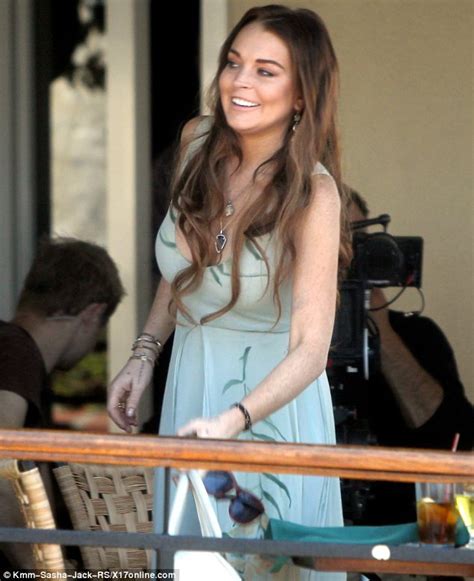 lindsay lohan is ethereal in green on set of the canyons but still can t resist a low cut