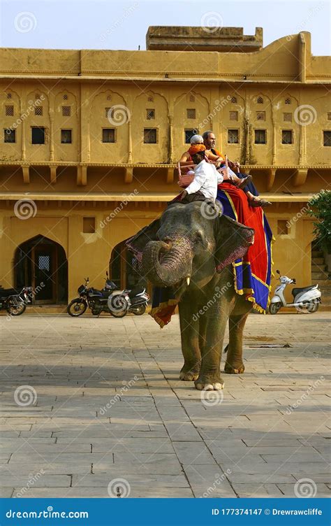 Ourists Enjoying An Elephant Ride In The Amber Fort Editorial