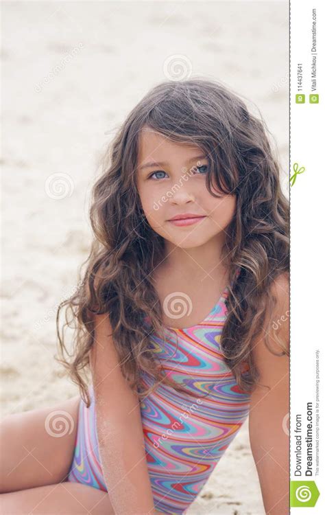 Close Up Portrait Of A Pretty Little Hispanic Girl With