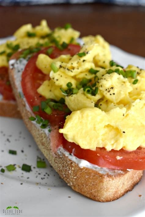 Scrambled Egg Breakfast Toast With Tomato And Chive Goat Cheese Olive