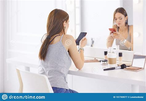 Amazing Young Woman Doing Her Makeup In Front Of Mirror Portrait Of Beautiful Girl Near