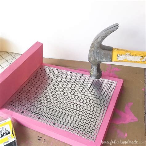 This stud earring rack would match pretty much any. Easy DIY Earring Stand - Houseful of Handmade